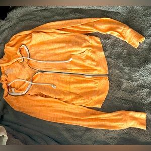 Orange Zip Up. Small. Women’s. Good condition.
